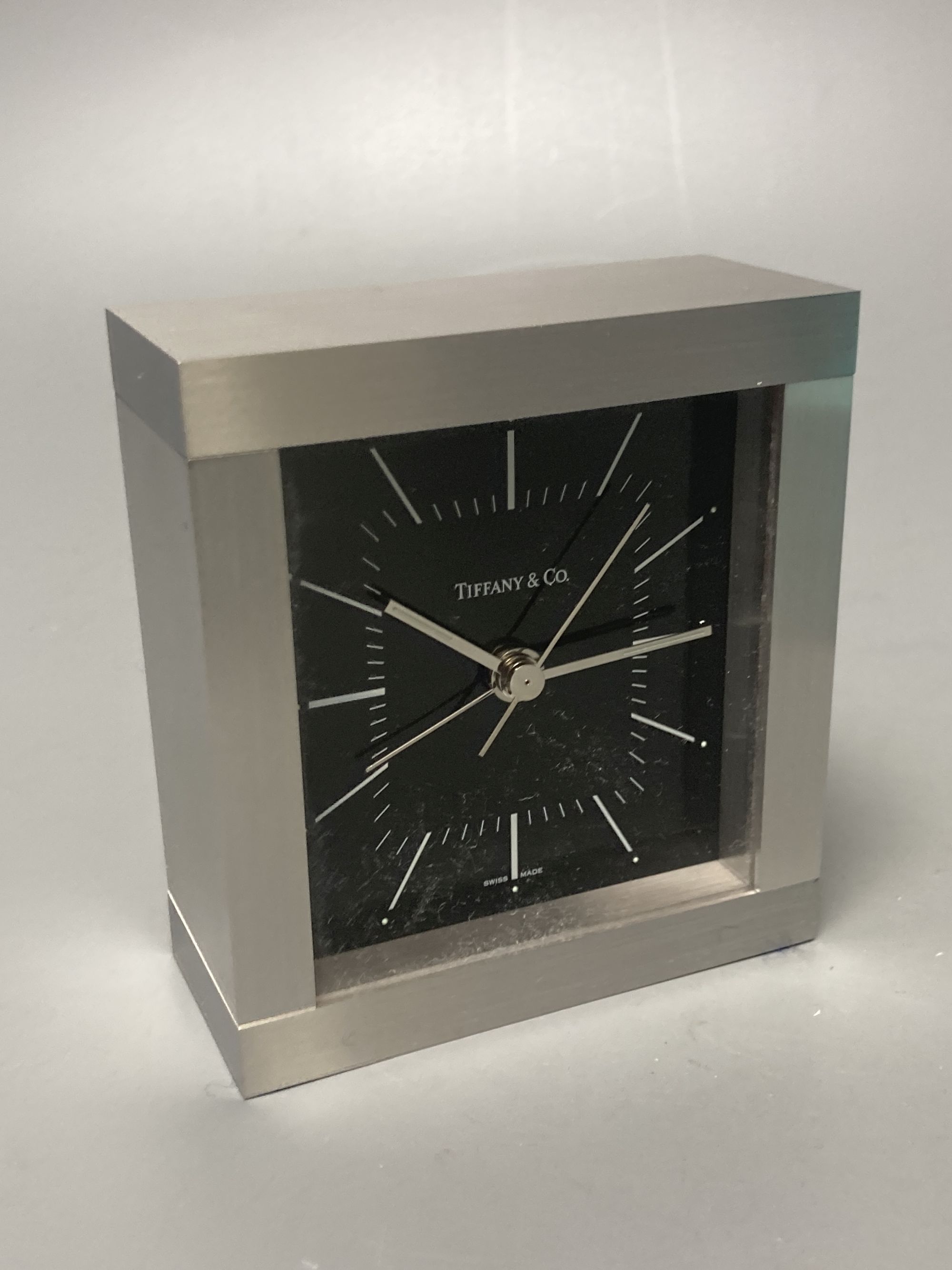 A boxed Tiffany alarm clock, 9 x 8cm